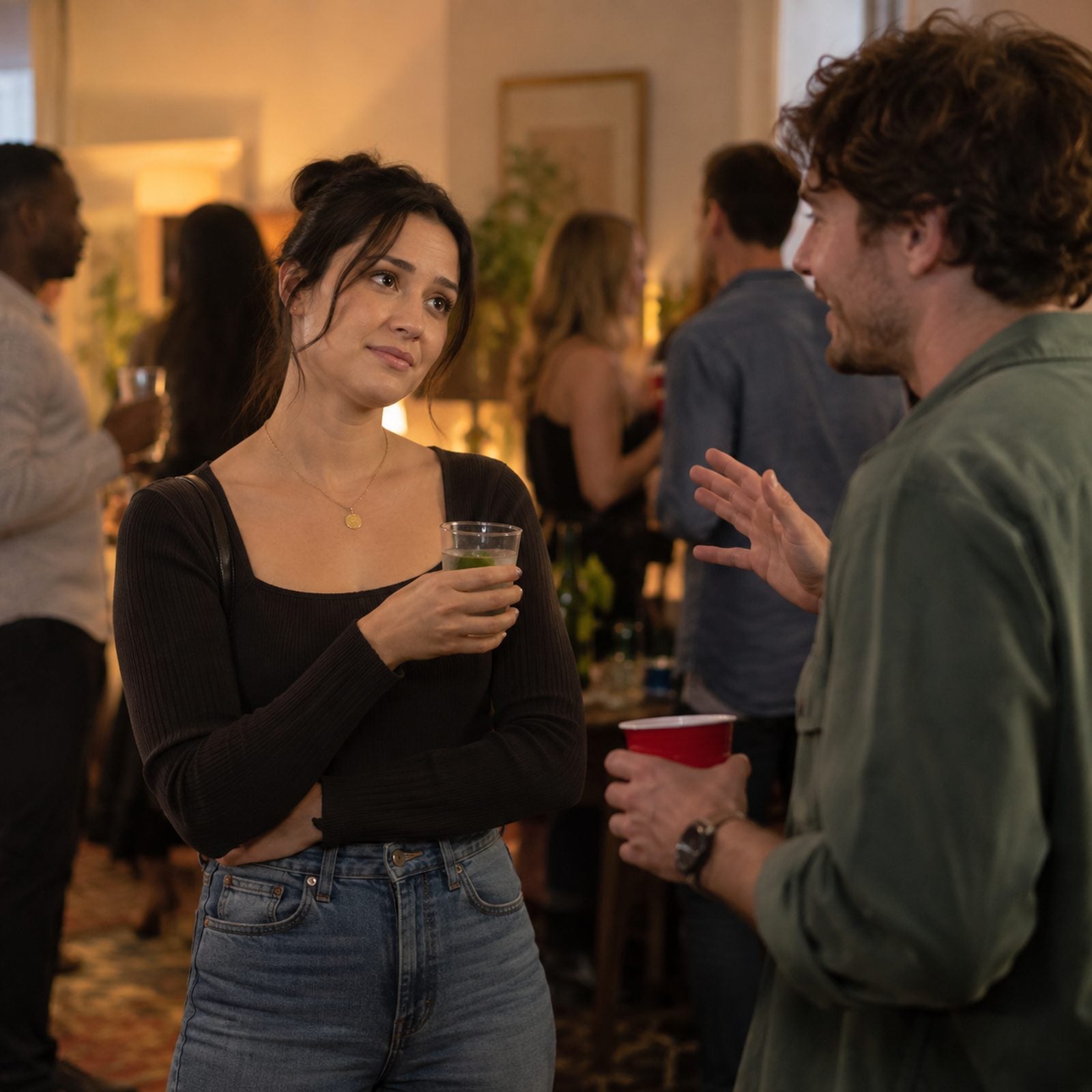 A woman cornered in conversation at a party